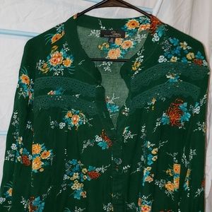 Green and floral blouse
